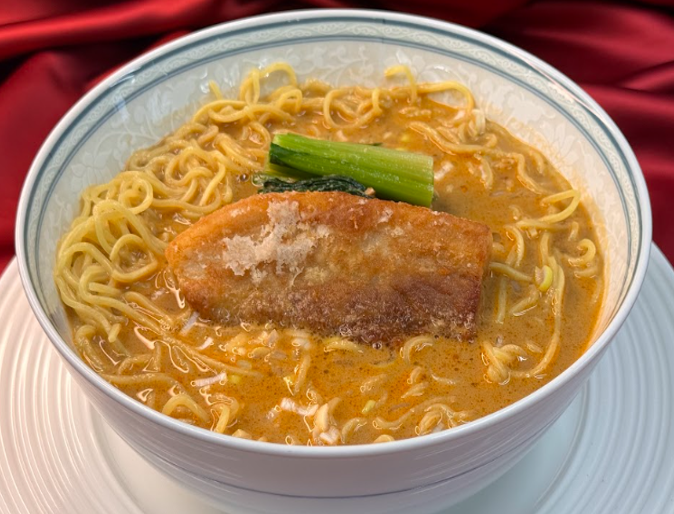 豚唐揚げのせ特製タンタン麵とギョウザの最強セット